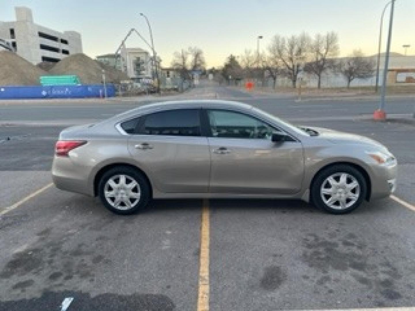 2015 Saharan Stone /Beige Nissan Altima 2.5 SV (1N4AL3AP8FC) with an 2.5L I4 DOHC 16V engine, CVT transmission, located at 8595 Washington St., Thornton, CO, 80229, (303) 287-5511, 39.852348, -104.978447 - 2015 Nissan Altima<br><br>D1 Auto NEVER charges dealer fees! All cars have clean titles and have been inspected for mechanical issues. We have financing for everyone. Good credit, bad credit, first time buyers.<br>Odometer is 2387 miles below market average!<br>Please call Lakewood Location 303-274- - Photo#3